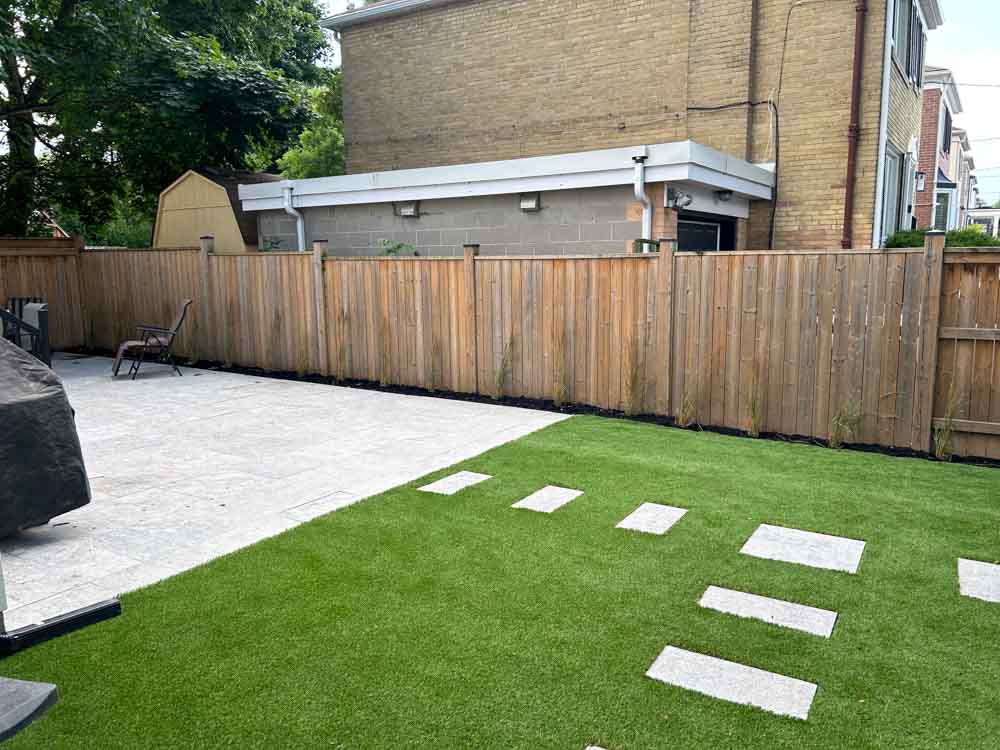 Hardscaping-img6 backyard with patio and grass built by Kerta Construction