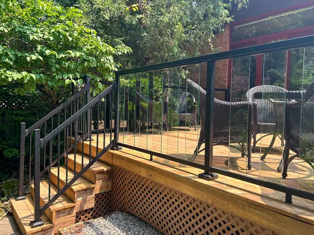 Internal-pg-img5 deck with glass railings and steps by Kerta Construction