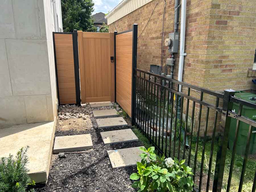 Outdoor-living-img3 pavers and fence with door by Kerta Construction