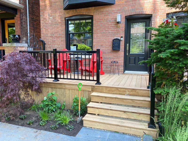 Portfolio-img-3 front door with custom deck and red chairs built by Kerta Construction