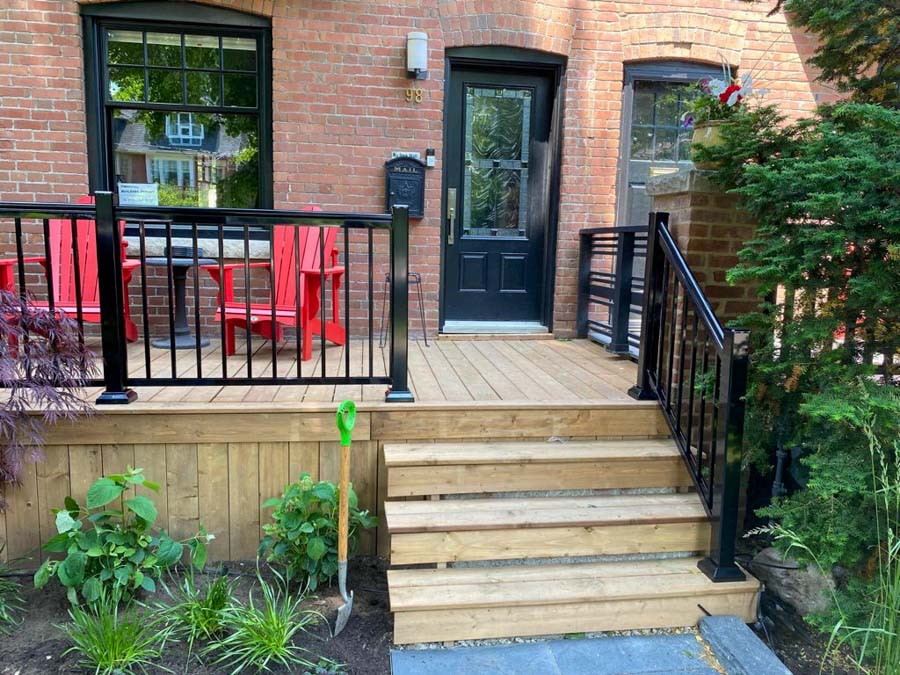 Portfolio-img-4 front door with custom deck and red chairs built by Kerta Construction