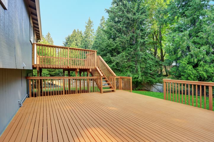 Multi-level wooden deck design for a modern Toronto home backyard